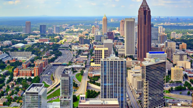 Aerial view of the downtown Atlanta skyline and highway in Georgia.