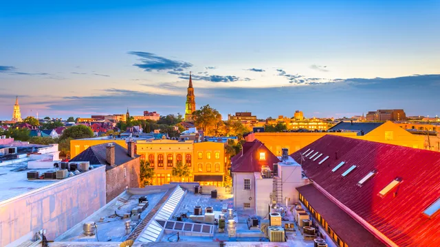Rooftops and a church steeple at sunset in South Carolina.
