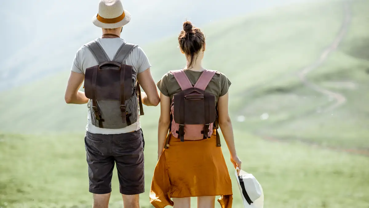 A couple hiking together in the mountains